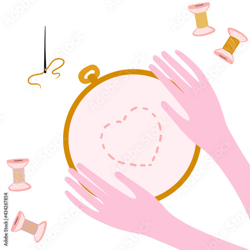  
hands with hoop for embroidery on the white background