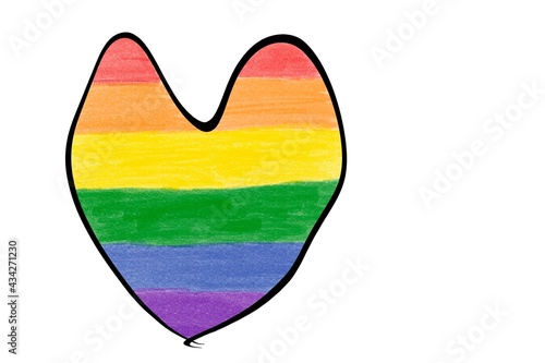 Drawing heart in rainbow colours, concept for celebrations of lgbtqai communities in pride month, June, around the world. photo