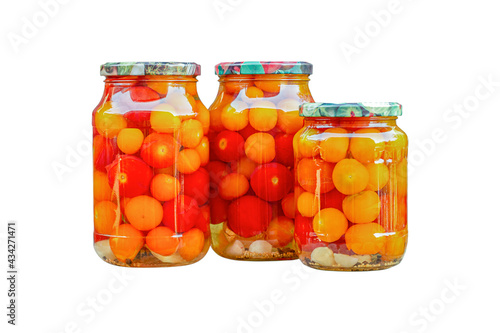 Tomatoes in glass jars, homemade pickles