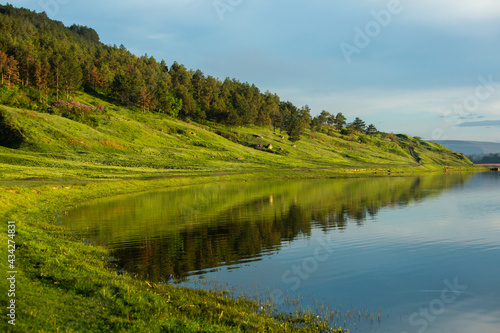 Beautiful Landscape with lake and trees. Amazing Nature in Europe. Lovely place to visit this summer.