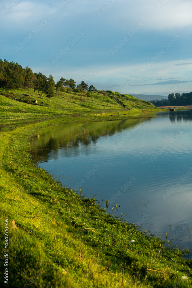 Beautiful Landscape with lake and trees. Amazing Nature in Europe. Lovely place to visit this summer.