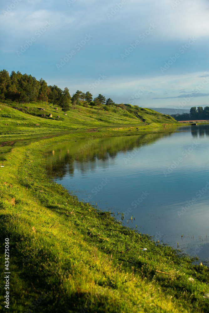 Beautiful Landscape with lake and trees. Amazing Nature in Europe. Lovely place to visit this summer.