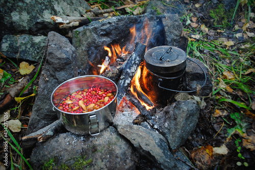 Food cooked over the fire in pots 