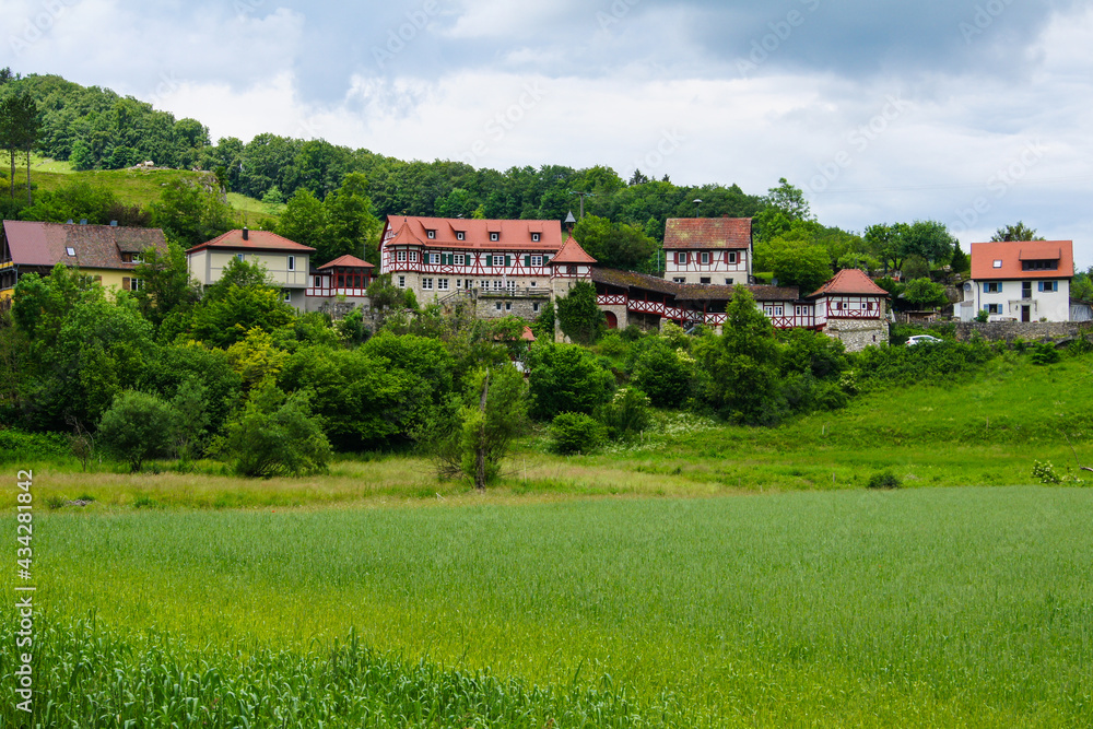 Beautiful view of the ancient village of Gundelfingen, Germany with many old half-timbered houses. The village is located in the UNESCO Biosphere Reserve. Beautiful view of the ancient village of Gundelfingen, Germany with many old half-timbered houses. The village is located in the UNESCO Biosphere Reserve.