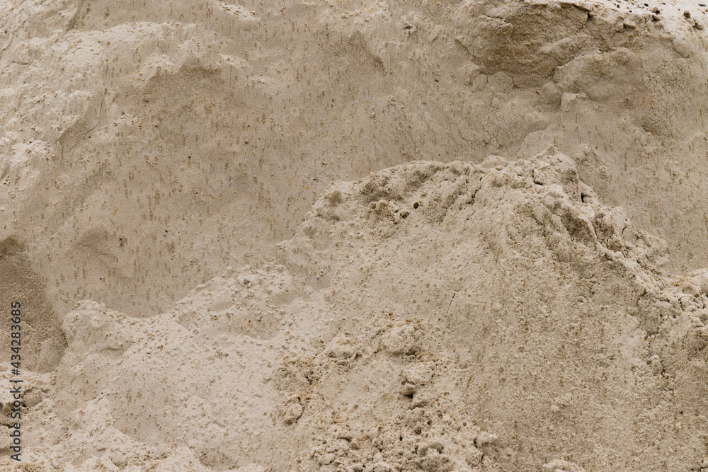 Sand Texture. Brown sand. Background from fine sand. Close-up image. Sand Texture. Brown sand. Background from fine sand. Close-up image.