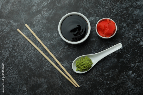 Concept of sushi eating on black smokey background
