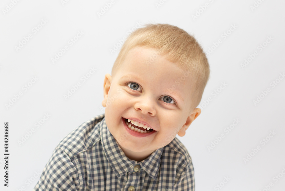 Close up portrait of cute little boy on white background Close up portrait of cute little boy on white background