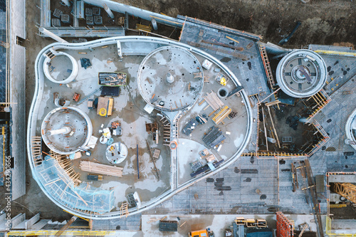 Aerial top down view of outdoor building activity site in progress from above in Kaunas, Lithuania. photo