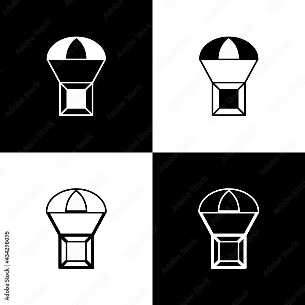 Set Box flying on parachute icon isolated on black and white background. Parcel with parachute for shipping. Delivery service, air shipping. Vector Set Box flying on parachute icon isolated on black and white background. Parcel with parachute for shipping. Delivery service, air shipping. Vector