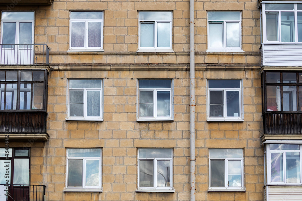 Russia. Saint-Petersburg. Realty. Windows of a residential apartment building.