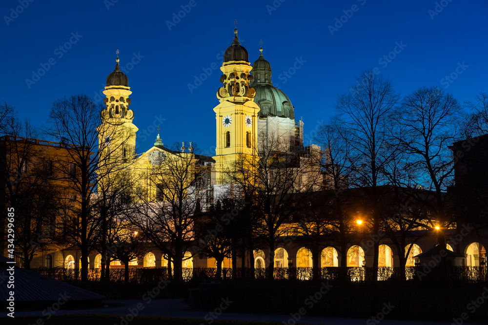 Illuminated baroque theatine church at night, Munich, Bavaria, Germany