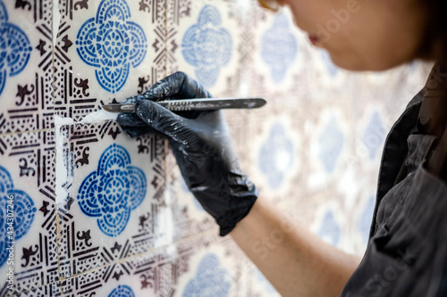 Restoring the beauty of vintage tile azulejos on the facade of old house