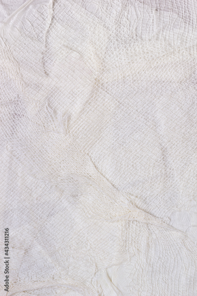 Textured handmade white textile background with mesh and paper base. Vertical background handmade for design Textured handmade white textile background with mesh and paper base. Vertical background handmade for design