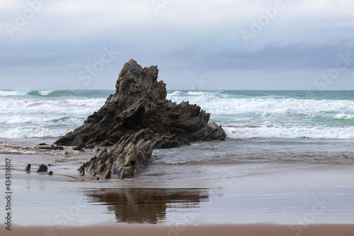 rock formation on the beach of sopelana, in the province of vizcaya photo