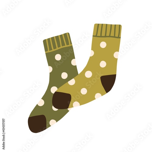 Pair of warm wool socks with polka dot pattern. Winter woolen feet clothes. Cute cozy cotton foot apparel. Trendy hosiery design. Flat vector illustration isolated on white background