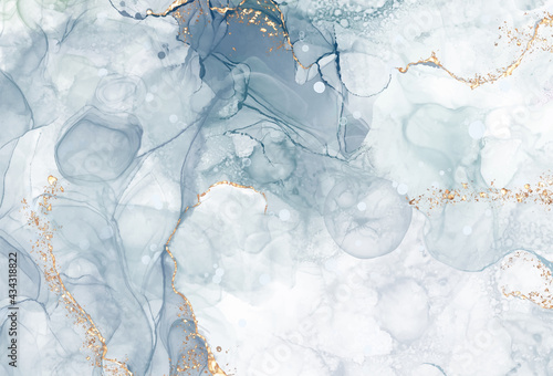Vector Alcohol ink shape in tender blue and gold.