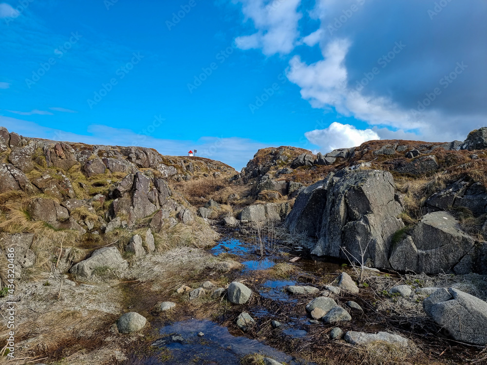 landscape with blue sky, rocky coast rocks coast atlantic