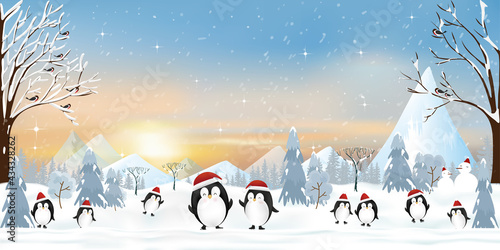 Winter wonderland landscape at arctic ocean with penquin family playing ice skating and standing on ice edge with snowing. Cute animals banner for New Year and Merry Christmas greeting card