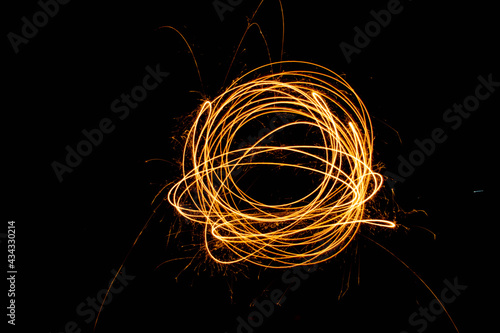 Abstract light trail art in night setting, long exposure 