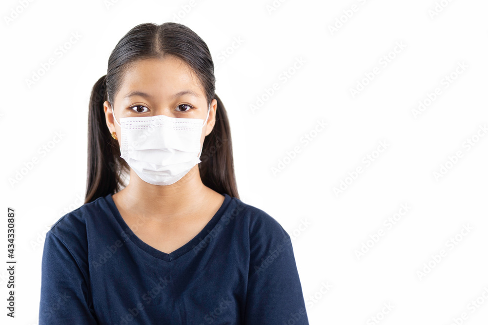 Asian young girl wearing protective mask against covid-19 isolated in clipping path. Asian young girl wearing protective mask against covid-19 isolated in clipping path.
