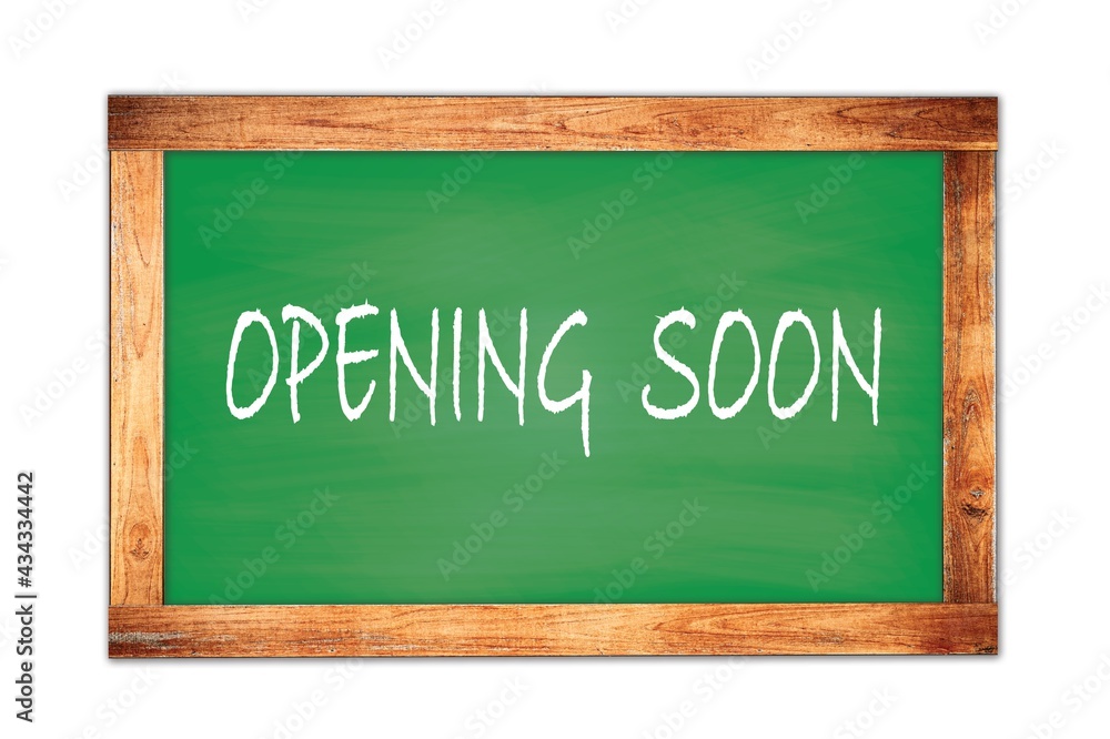 OPENING SOON text written on green school board. OPENING SOON text written on green school board.