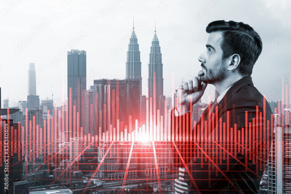 Φωτογραφία A young Caucasian handsome trader and stock market analyst in suit dreaming about market behavior and forecast in crisis