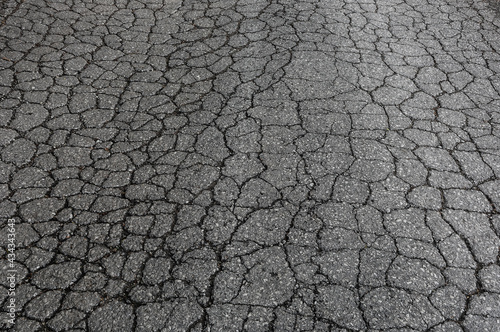 Cracks in asphalt road, Austria © Mikael