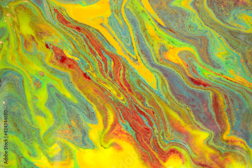 Abstract bright wave marble pattern with golden glitter. Fluorescent artwork liquid paint background. © anya babii