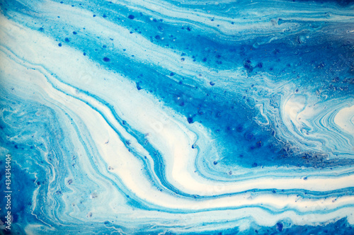 Marble blue and white abstract background. Liquid ink texture.