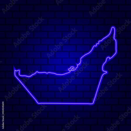 UAE glowing neon sign on brick wall background