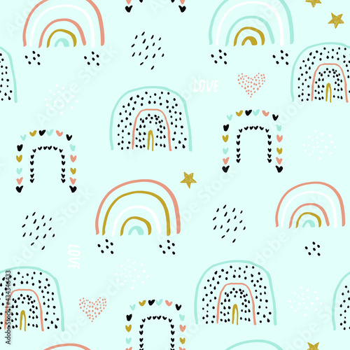 Childish seamless pattern with hand drawn rainbows on blue background. Trendy kids vector texture.