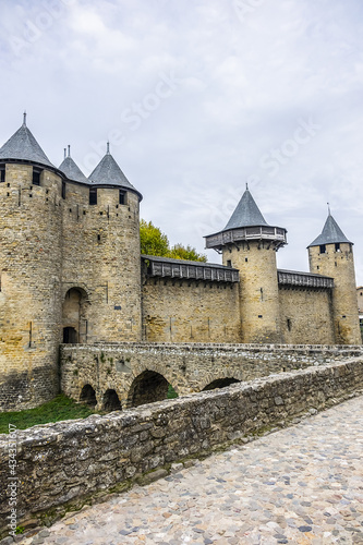 Entrance to Chateau Comtal in the walled and turreted fortress of Carcassonne La Cite. Carcassonne, Languedoc, region of Occitanie, France.