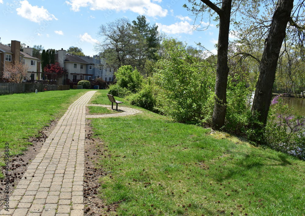 Brick path walkway along a suburban town home development
