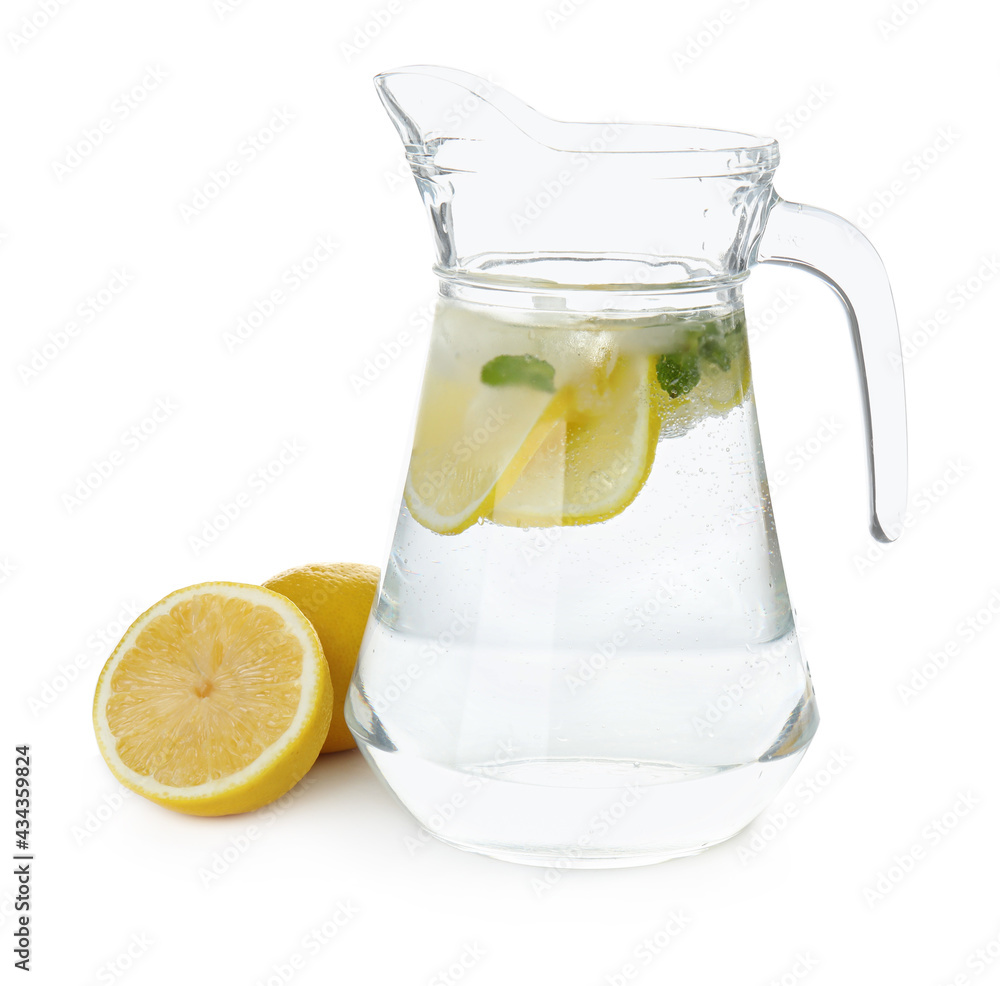 Glass jug of cold lemonade on white background Glass jug of cold lemonade on white background