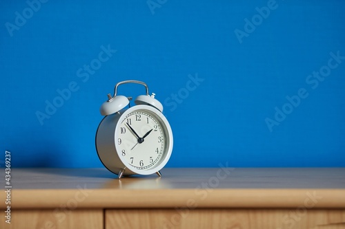 Alarm Clock on a Shelf photo