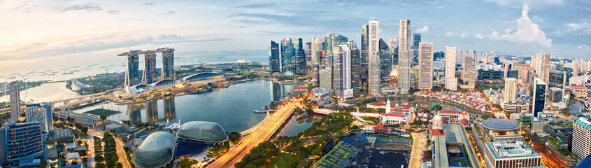 Singapore skyline panorama at sunrise, financial district and Marina Bay