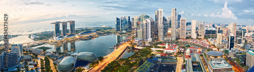 Singapore skyline panorama at sunrise, financial district and Marina Bay