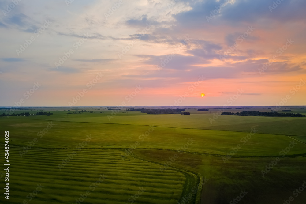 Fields of Belarus before sunset at dusk