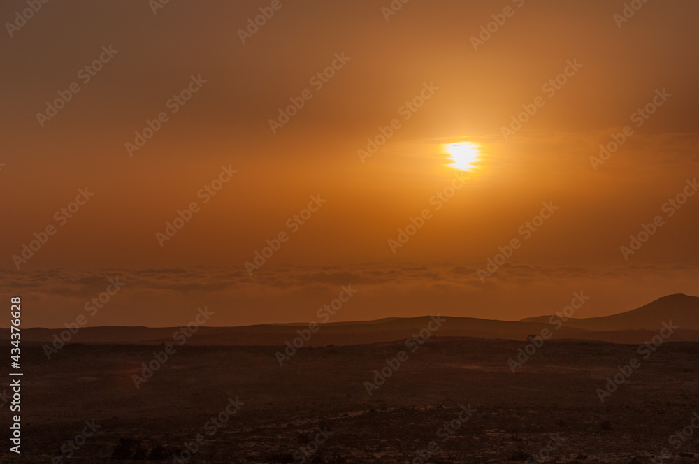 Sunset over Clouds, photo is taken from the mountains of Salalah, south of Oman Sunset over Clouds, photo is taken from the mountains of Salalah, south of Oman