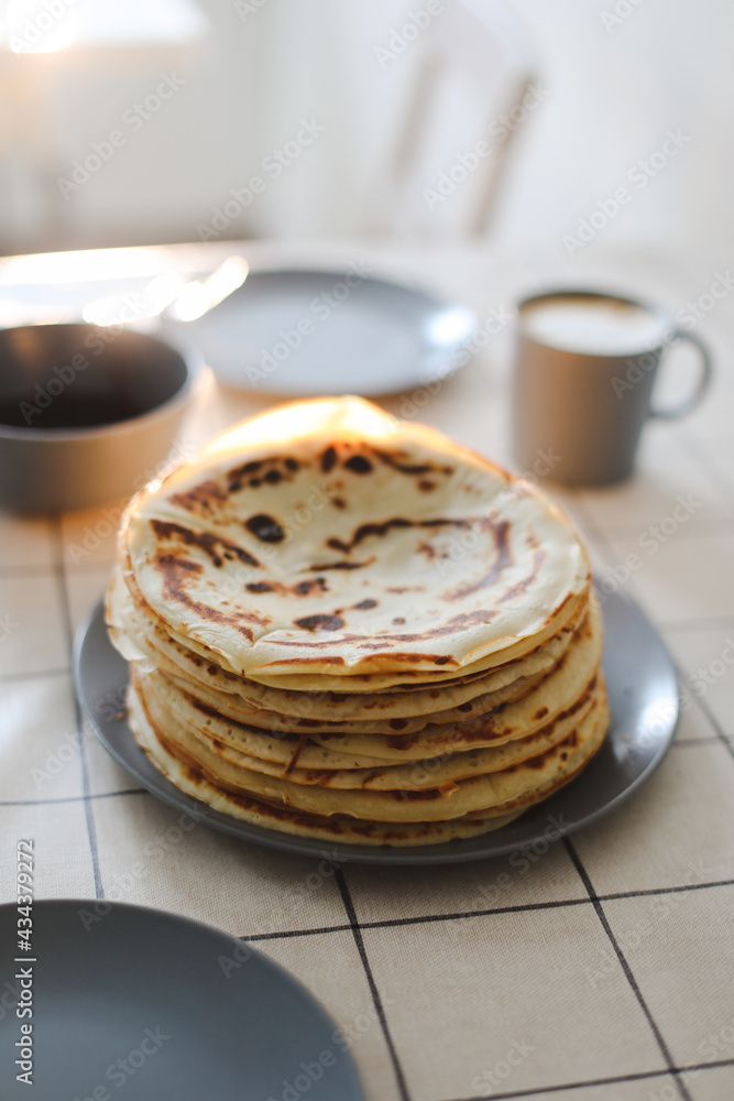  Stack of delicious homemade pancakes on a plate with coffee. Good morning, breakfast concept. Food photography. Copy space, flat lay
