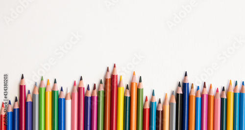 Colouring pencils isolated on white background close up concept with copy space for text
