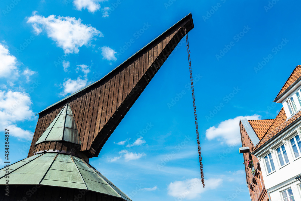 Old crane in the harbor in Stade, Germany Old crane in the harbor in Stade, Germany