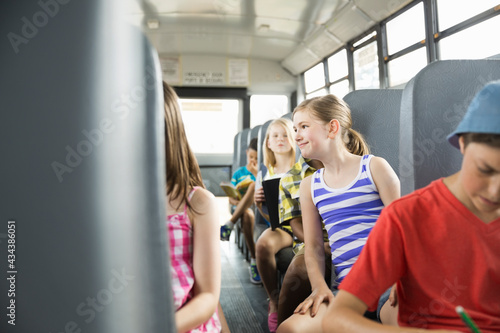 Schoolchildren in bus going for field trip