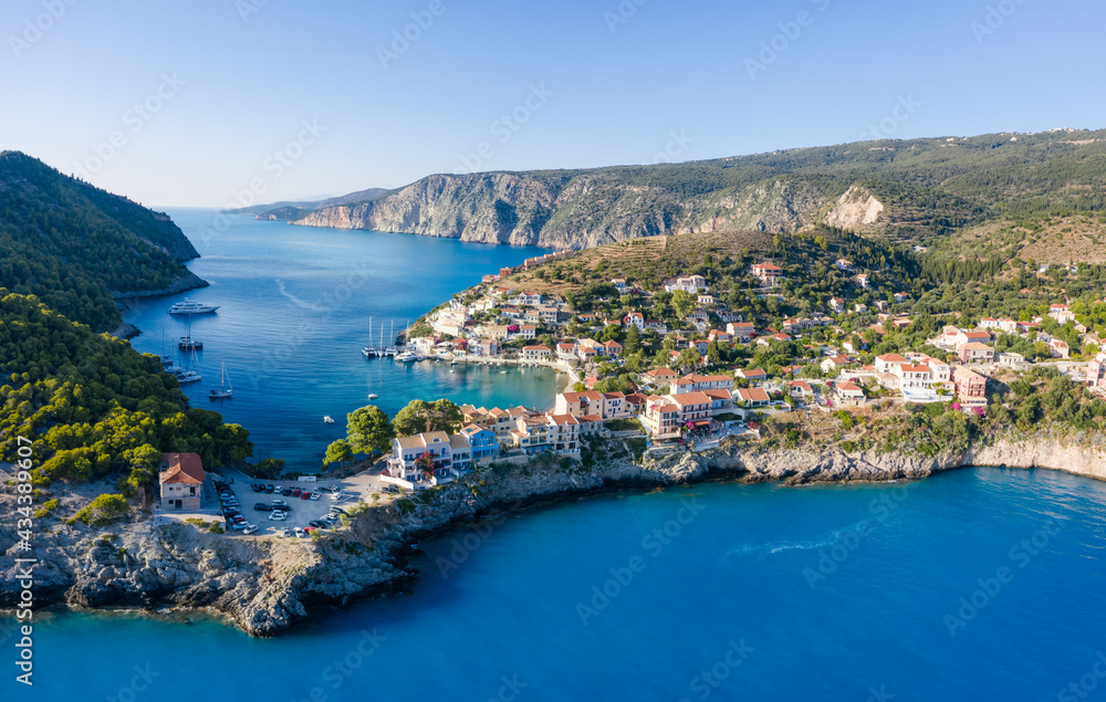 Assos in island of Cefalonia, Ionian, Greece. Aerial drone photo of beautiful and picturesque colorful traditional fishig village