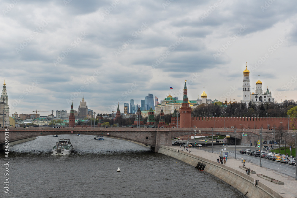 Panoramic view of Moscow center, famous Moscow landscape: Kremlin, cathedrals, Moscow City skyscrappers, river and embankment. Scenery panorama of famous touristic places.