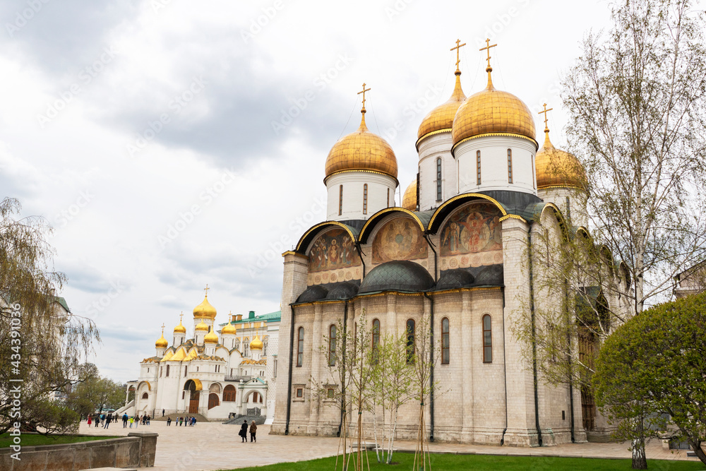 CLose up image of catherdrals with golden domes on Sobornaya square in Kremlin Moscow.  Magnificient ancient architecture of historical churches, famous touristic places in Moscow.