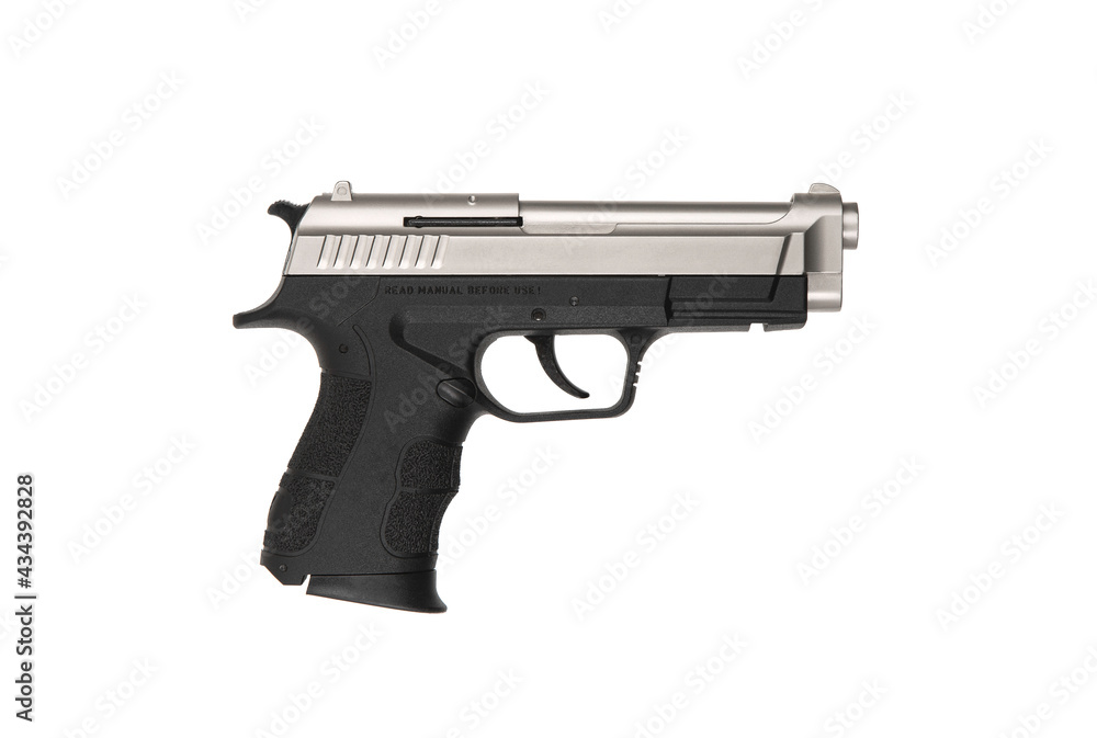 Black silver modern pistol on a white back. A short-barreled weapon for concealed carry. Armament of the police, army and special units. Black silver modern pistol on a white back. A short-barreled weapon for concealed carry. Armament of the police, army and special units.