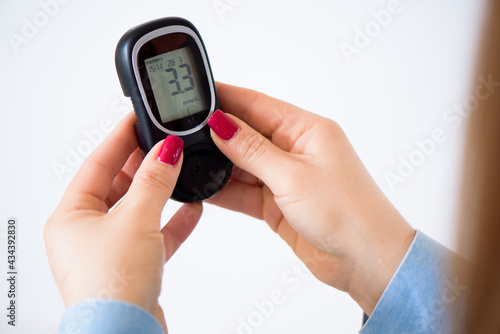 The diabetic measures the level of glucose in the blood. Diabetes concept. Diabetic supplies on a white background