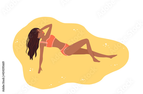 black girl sunbathing on the beach