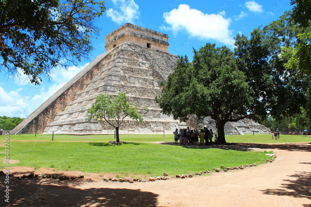 The Temple of Kukulcan El Castillo at the center of Chichen Itza archaeological site. Territory of Mayan city of Chichen Itza, popular historical site on Yucatan. One of 7 New Wonders in Mexico